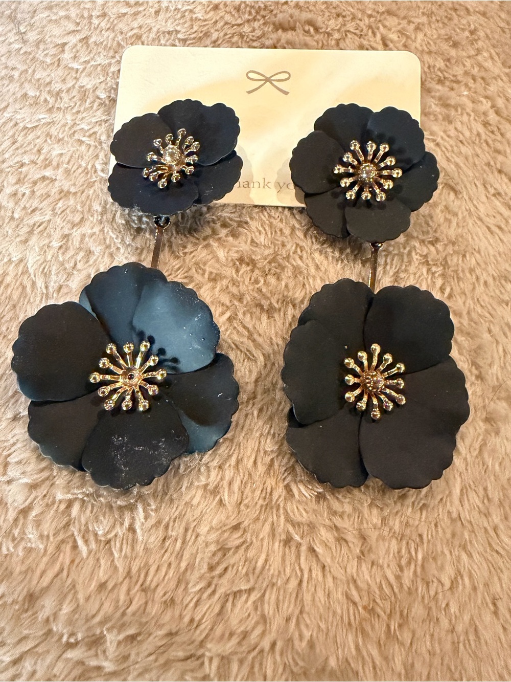 Statement floral earrings in black